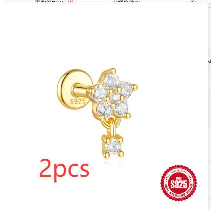S925 sterling silver geometric moon and star earrings with diamond detail on a gold tone background.