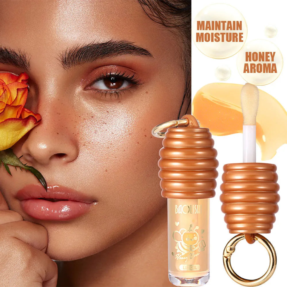Honey Lip Gloss attached to a keychain for portable lip moisturising