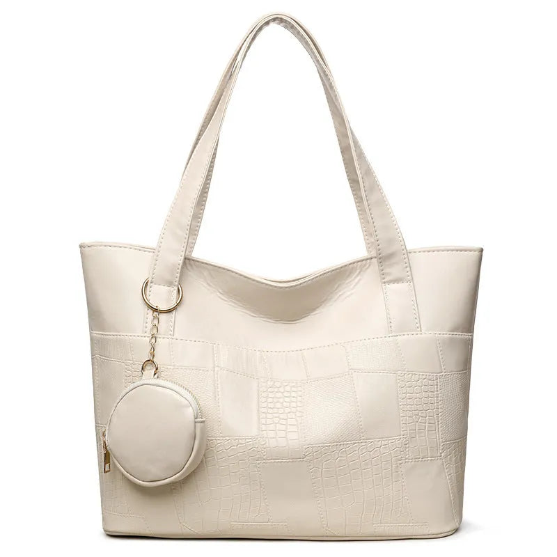 Large capacity soft PU tote bag for women in beige, brown, and black, with double shoulder straps and sewing thread detail.