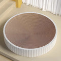 Green and white round cat scratching board with replaceable corrugated paper panels measuring 55 cm