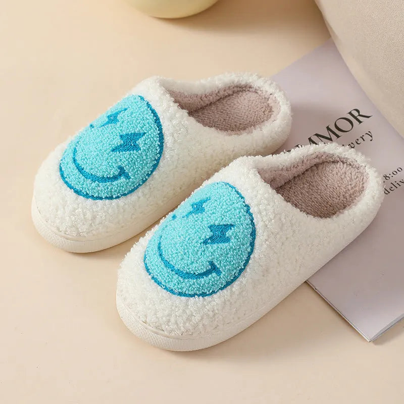 Women's plush home slipper with cartoon graphic print and non-slip PVC sole.
