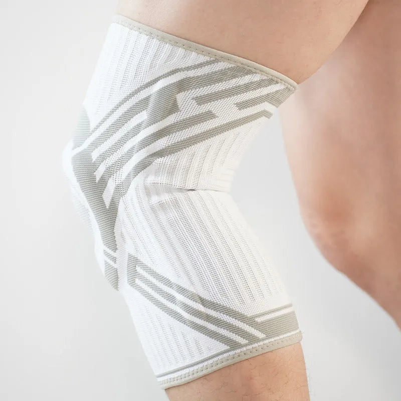 Adult cotton knee pads in blue, grey, and yellow colours, shown for sports like basketball and running.