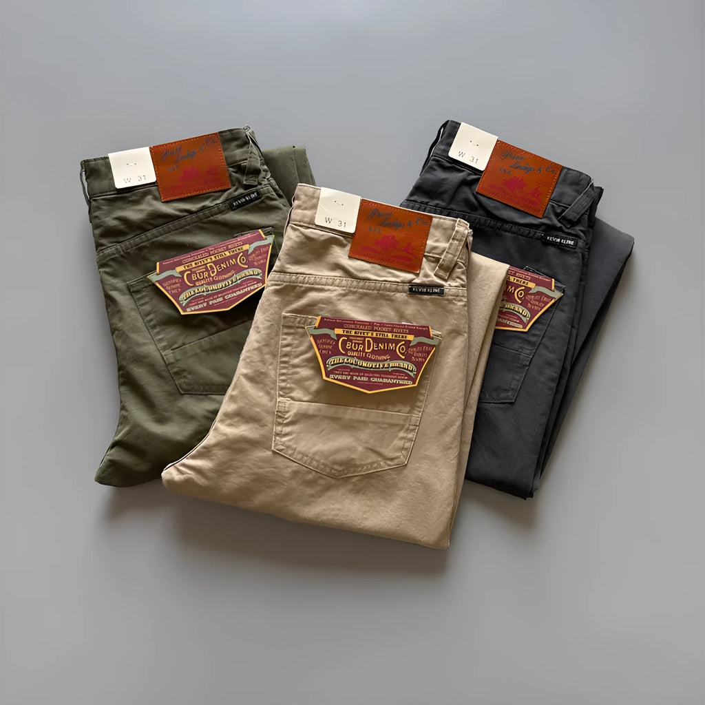 Men's straight-leg cotton casual trousers in grey, army green, and khaki colours on a mid-rise waist.