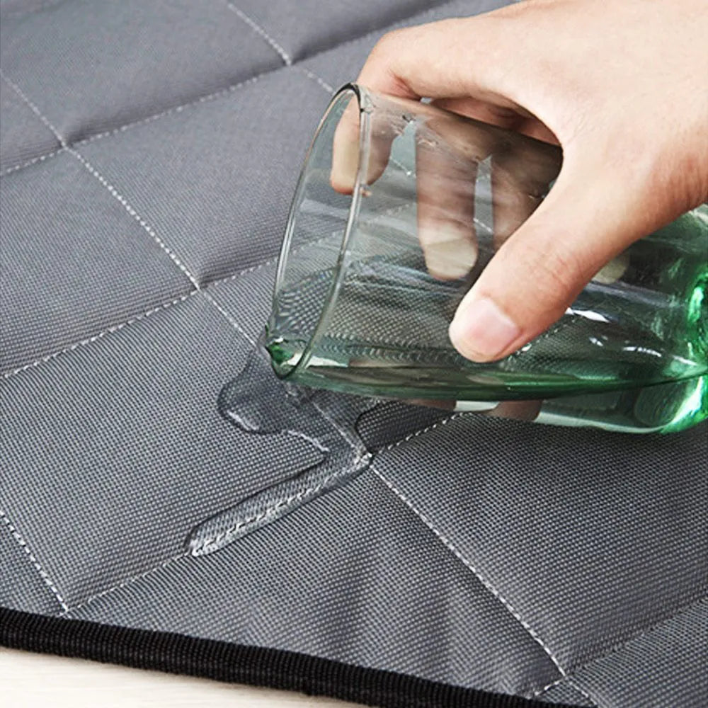 Non-slip cooling pet mat in gray cloth, waterproof and breathable, available in five sizes S to 2XL