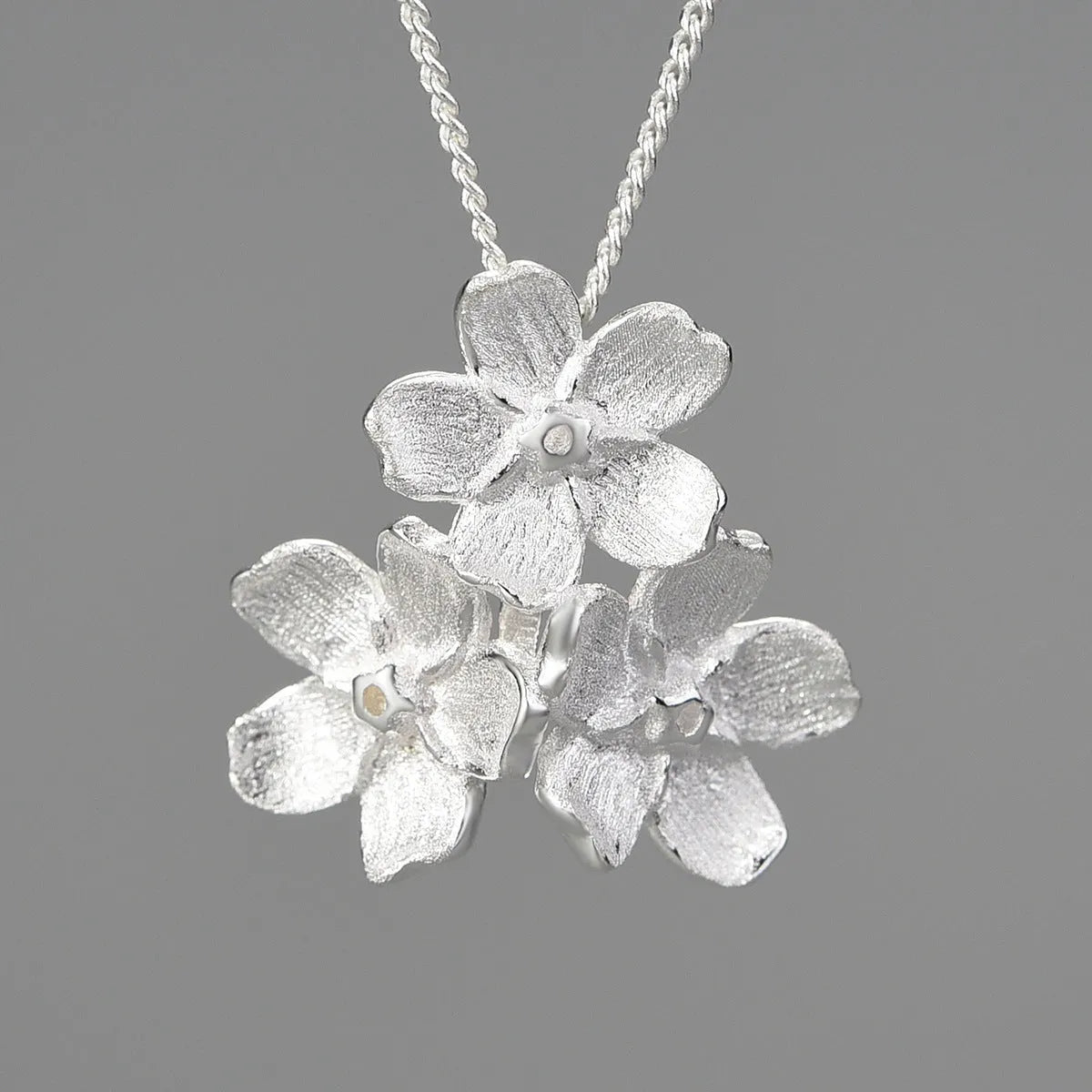 Sterling silver Myosotis sylvatica flower pendant in pastoral style with electroplated finish options