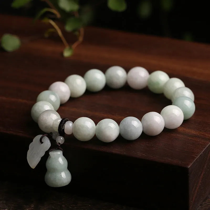 Natural jade hanging bracelet with geometric shape showing six colour and design variations.