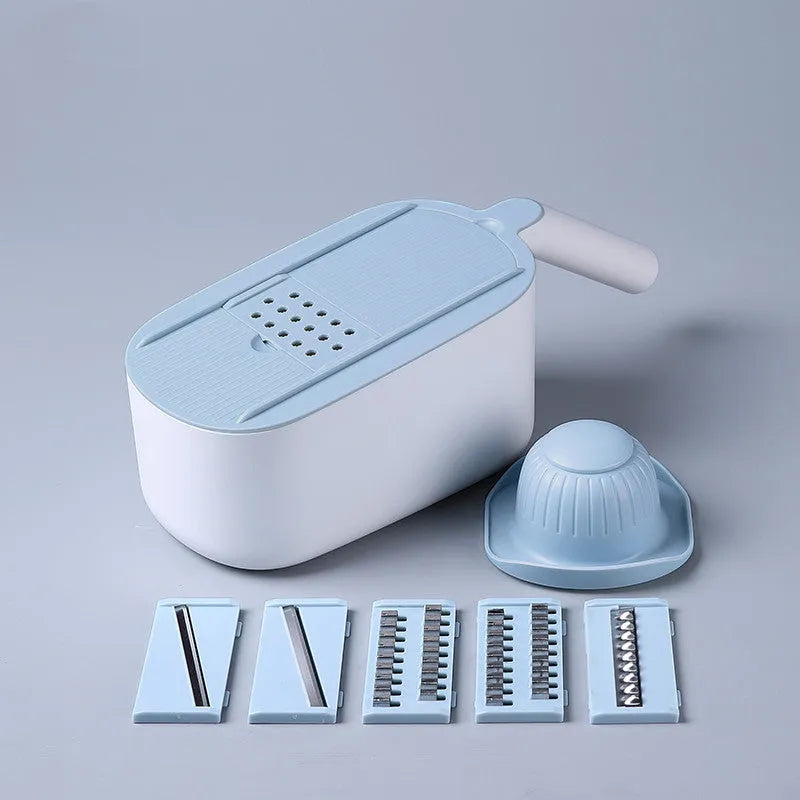 Nordic style multifunctional vegetable cutter with stainless steel blades in blue colour.