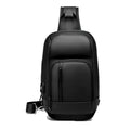 Black square vertical PVC shoulder bag showing organiser pockets and air cushion strap.