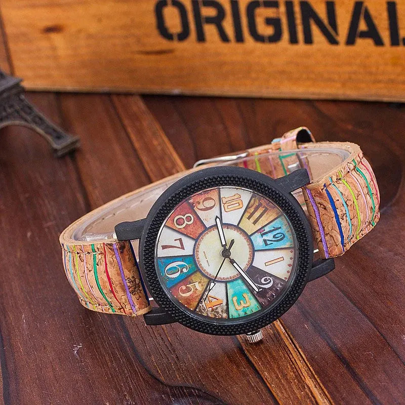 Women's vintage style leather strap quartz watch with 37mm round dial and stainless steel buckle