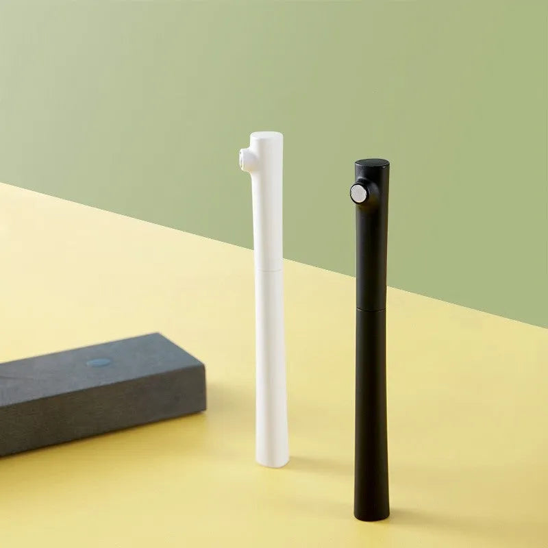 Red Dot Award fountain pen with 0.7mm stainless steel nib in black or white resin holder.