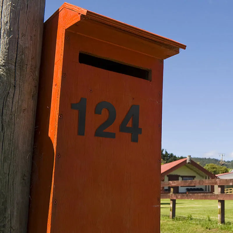 Black stainless steel sticky house number sign showing digits 7.5 cm tall