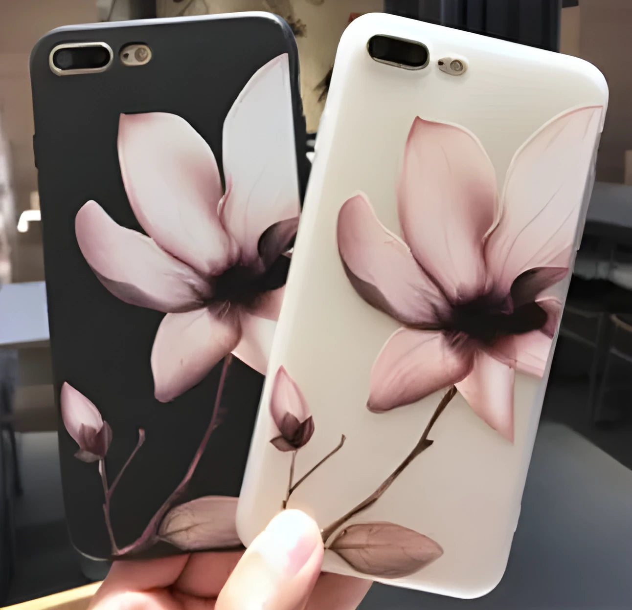 Embossed floral TPU iPhone case in black and white showing raised flower pattern design