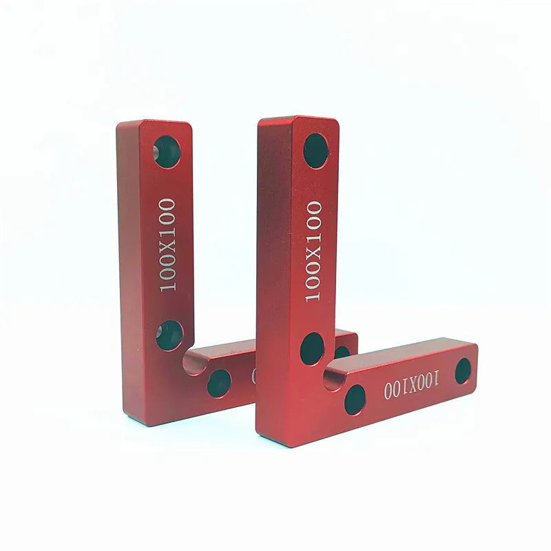 Machined aluminium right angle positioning block for woodworking jigs, showing 90-degree internal corner and scale.