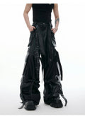 Black loose-fit retro trousers with quilted detailing and multiple pockets