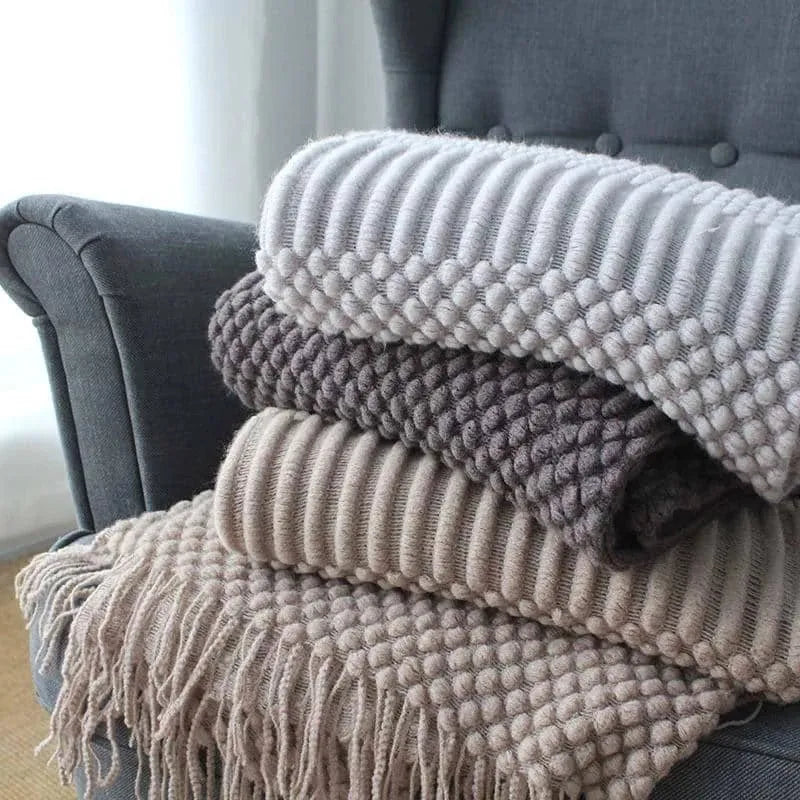 Small light grey polyester nap blanket laid flat showing its 127x170cm size.