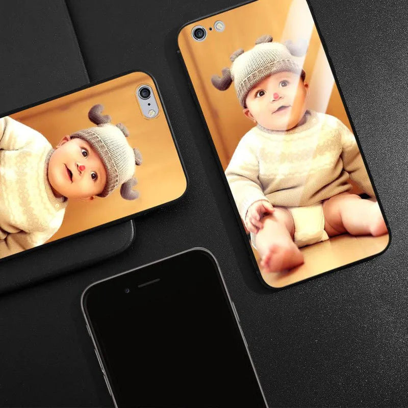 Patterned iPhone case with raised edges on a table next to an iPhone.