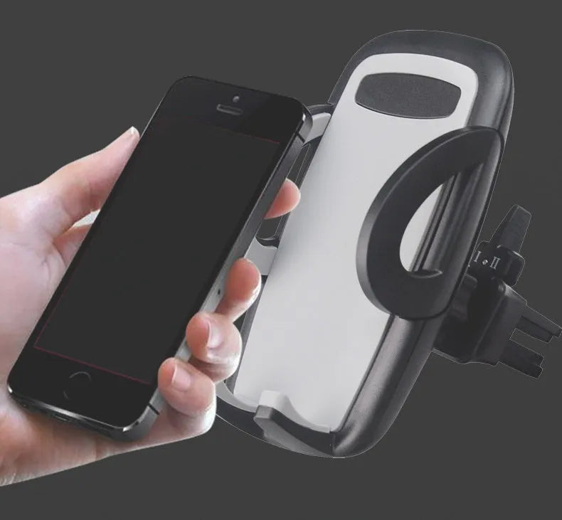 Black plastic car air conditioning outlet mobile phone holder mounted to car vent