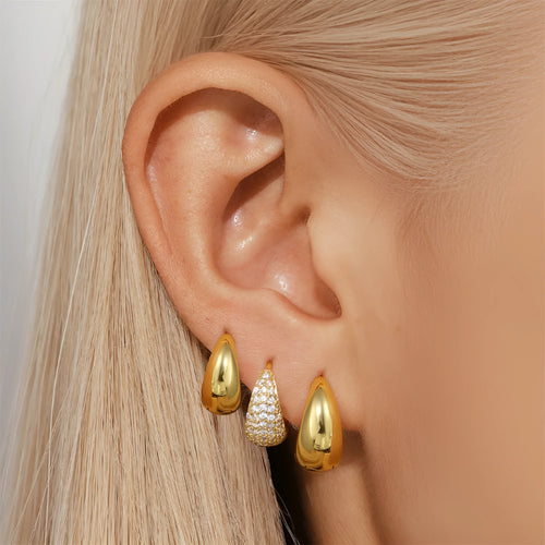 Brass diamond earclip earrings with geometric shape and gold electroplated finish