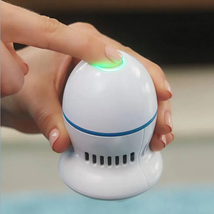 Multifunctional electric foot file grinder in beige with two diamond grinding heads and sponge ring