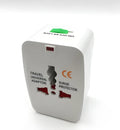 Compact universal travel plug adapter for international sockets, dimensions 73mm by 50mm by 39mm