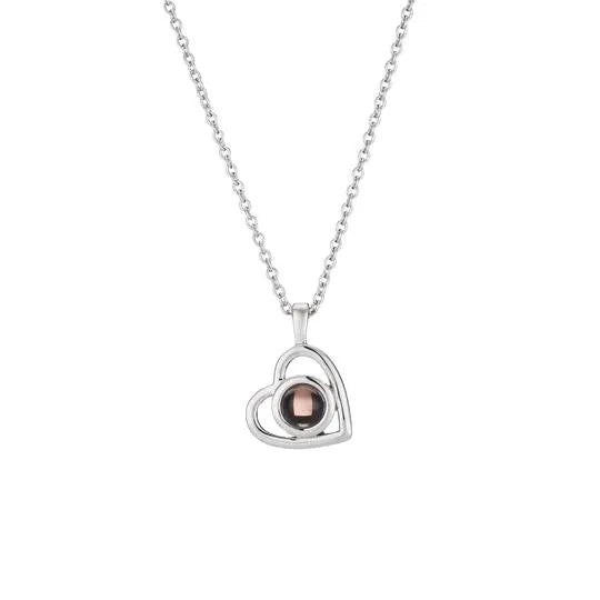 925 silver heart shaped pendant with custom photo projection feature on white background