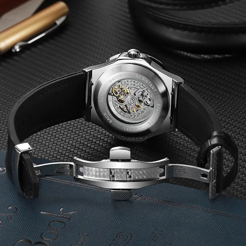 Automatic men's watch with diamond studded hollow dial in a white case.