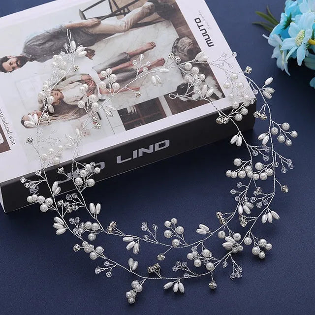 Gold metallic long hair band for brides with pearls, shown coiled.