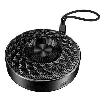 Compact black Bluetooth speaker with silicone cover showing control buttons.