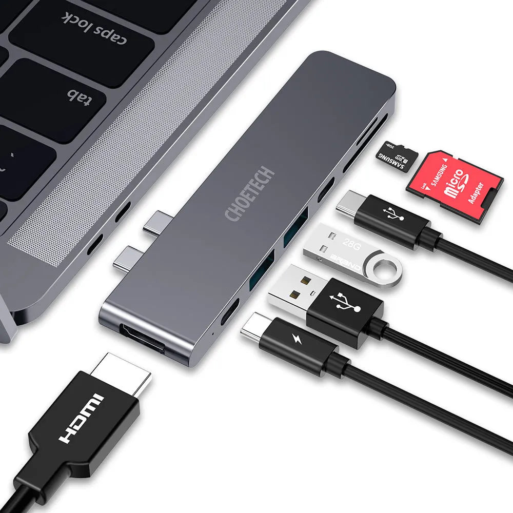 Aluminium USB-C multi-port adapter with SD card slot, HDMI, USB, and Thunderbolt ports