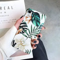Retro floral banana leaf design on a soft TPU back case for an iPhone.