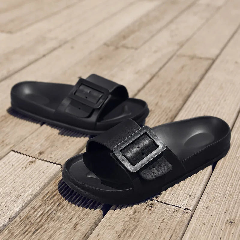 Women's grey blue EVA buckle slipper sandals showing adjustable strap and soft sole