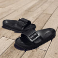 Women's grey blue EVA buckle slipper sandals showing adjustable strap and soft sole