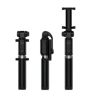 Black Bluetooth selfie stick with extended tripod legs holding a smartphone