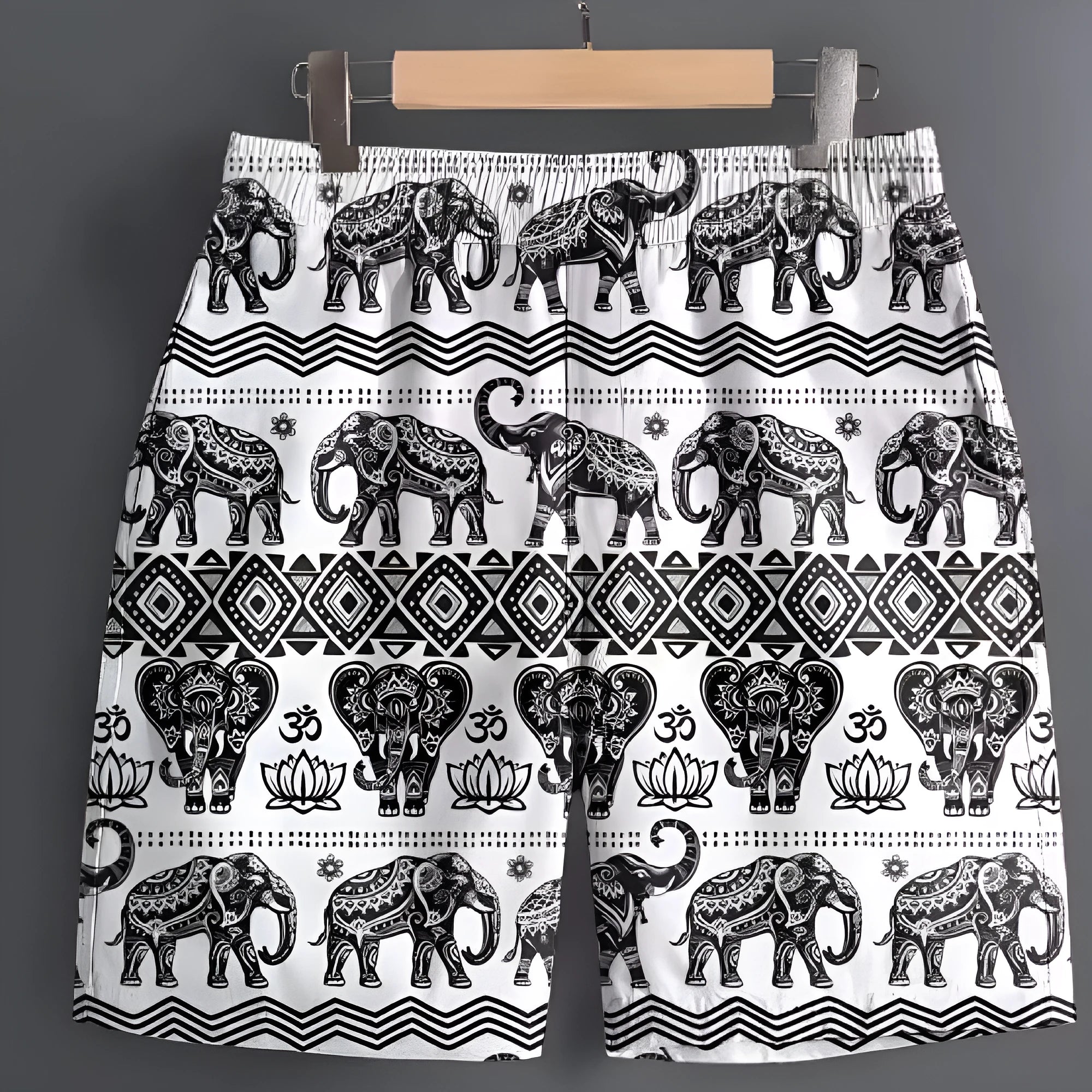 Men's polyester casual sports shorts in camouflage pattern on a hanger.