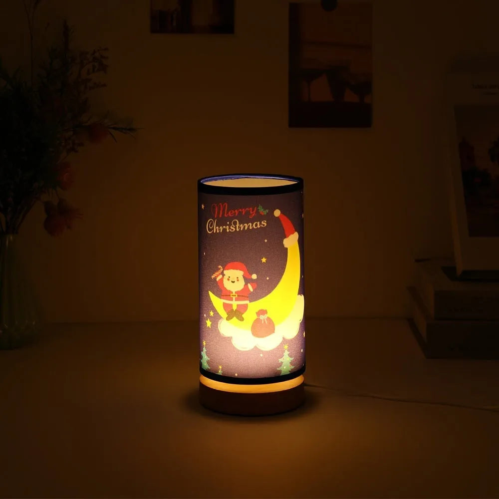 Moon Santa Claus themed LED night light with a bamboo base and a USB plug.