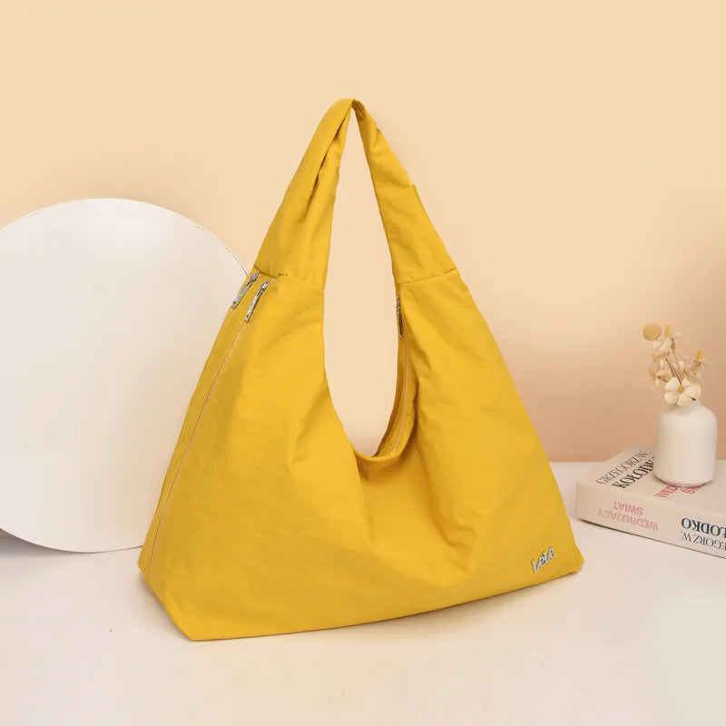 Heart-shaped nylon underarm bag for women in black, blue, khaki, or yellow