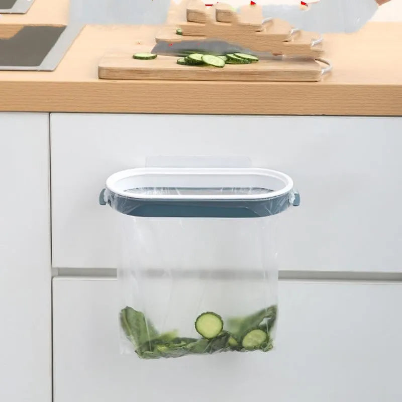 Blue plastic kitchen rubbish bag storage rack designed for under-cabinet mounting.