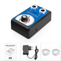 Car spark plug tester and ignition system diagnostic tool on a workbench