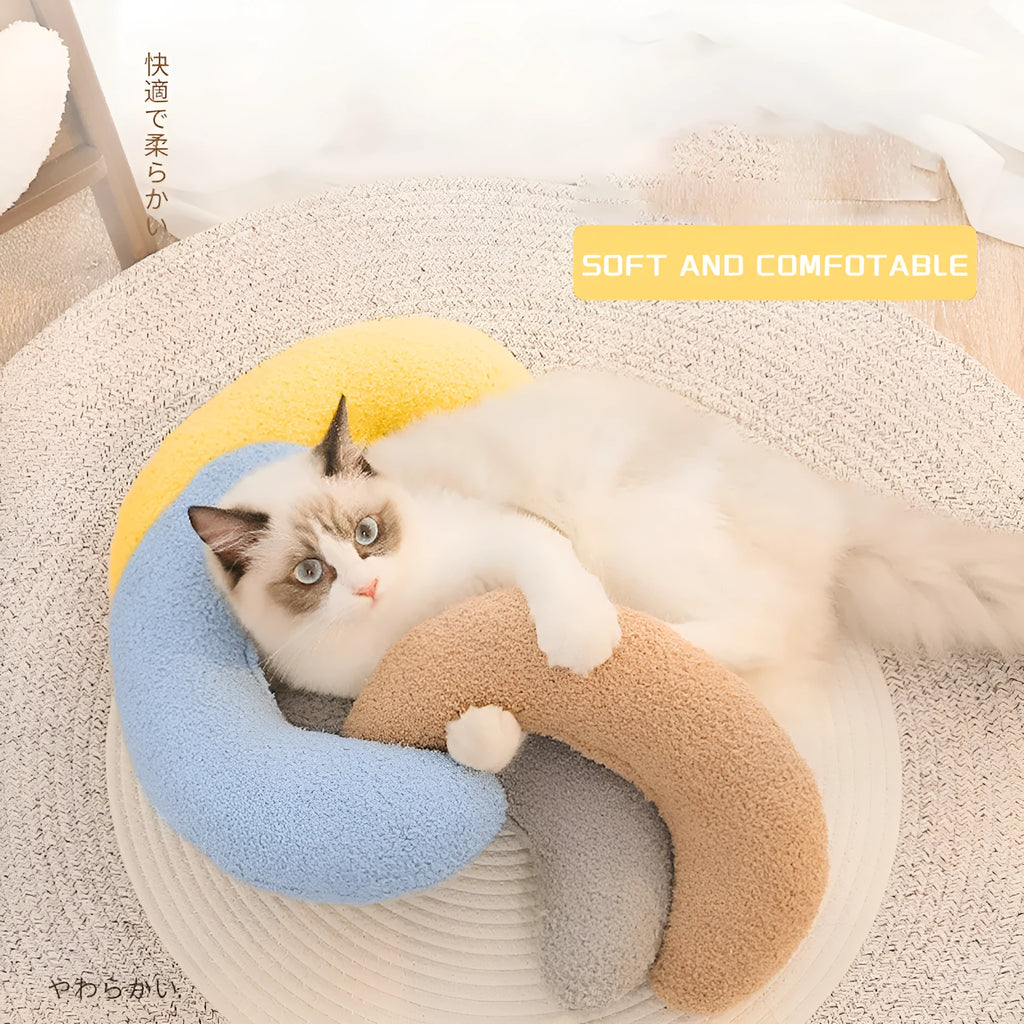U-shaped blue cat pillow with adjustable fabric collar for pet cervical support