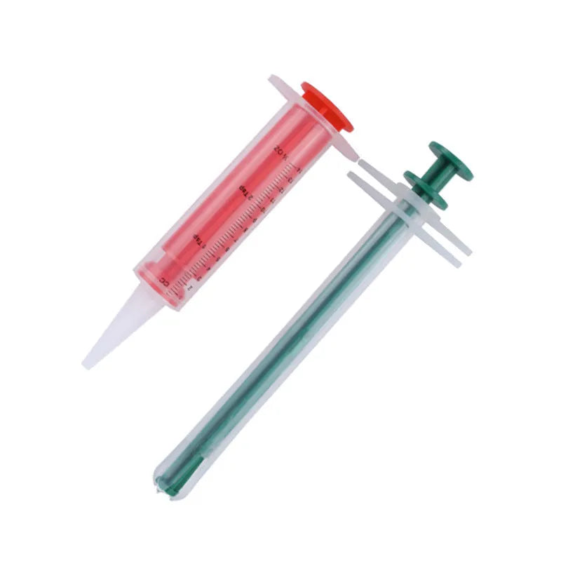 Two silicone gel pet pill shooter guns with soft tips for cats and dogs