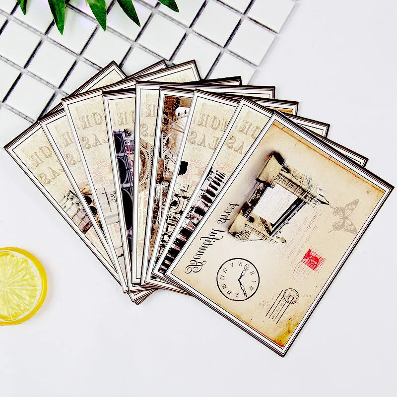 Nine Japanese-style minimalist postcards with cartoon illustrations of retro Paris towers and historic sites