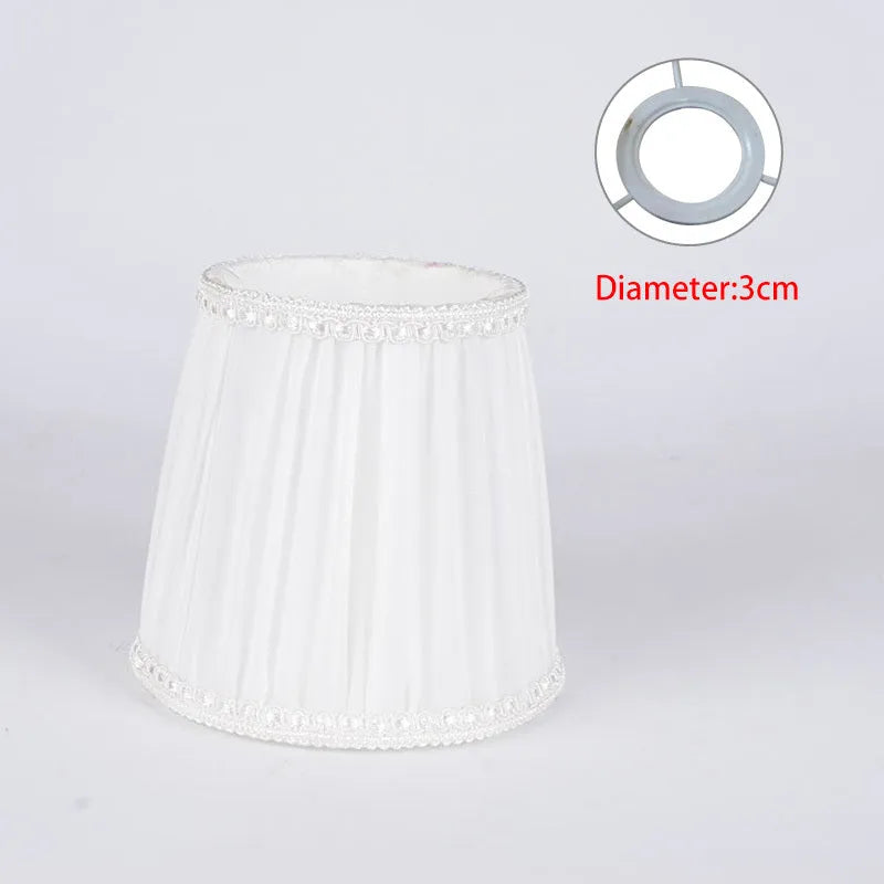 Fabric lampshade for a crystal candle chandelier in dark blue colour.