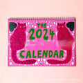 Cat-themed 2024 and 2025 wall desk calendar planner with animal motif printed on paper