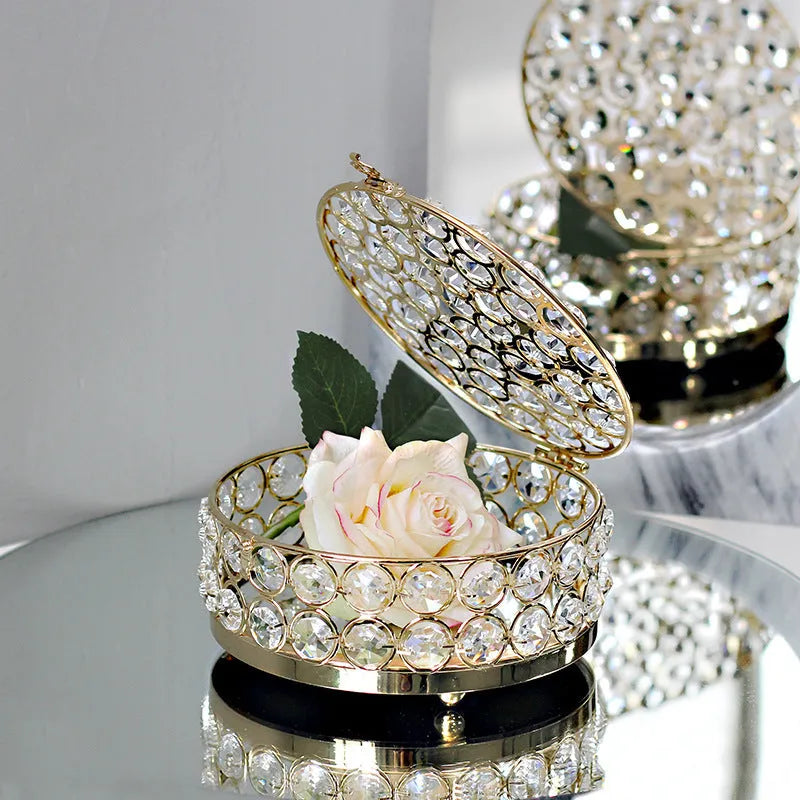 Crystal glass jewelry storage box with transparent sides and French gold metal frame