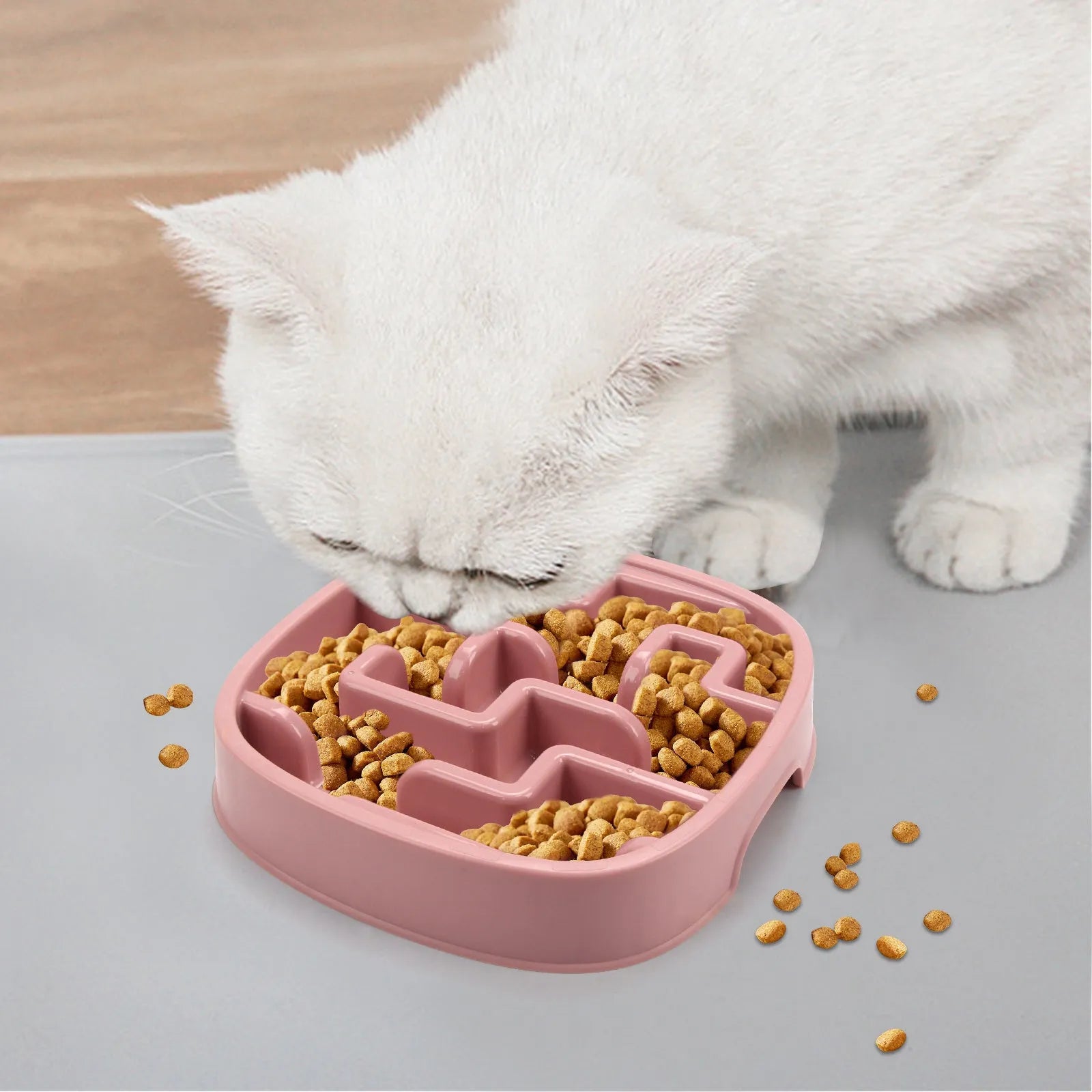 Square macaron-coloured slow feeder bowl with maze pattern for dogs and cats.