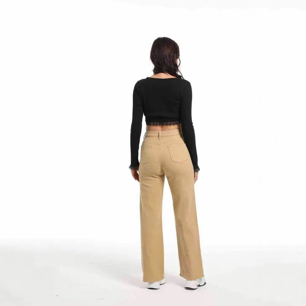 Women's high-waisted wide-leg straight jeans in apricot colour on a model.