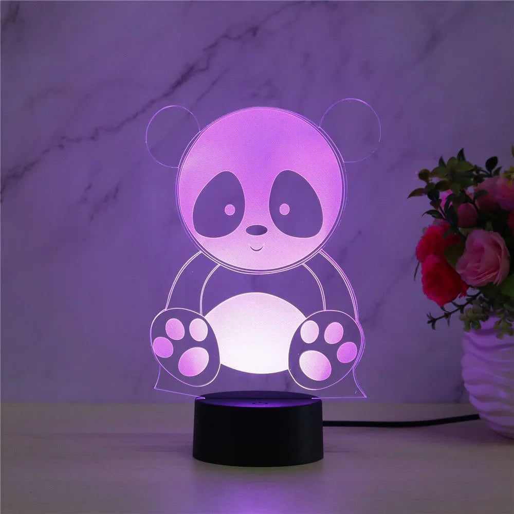 Panda shaped night light with remote control showing seven colour LED illumination