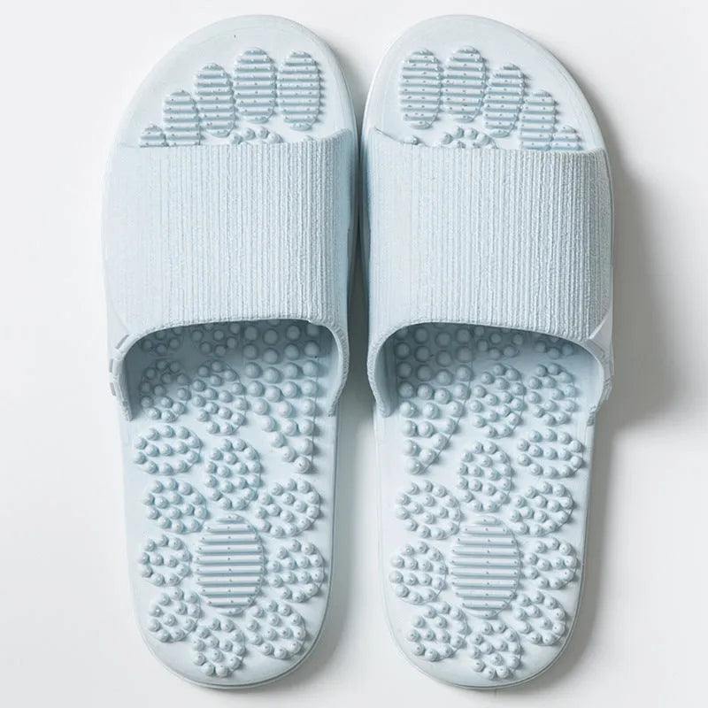 Reflexology acupressure slippers in EVA material with 3D massage particles, available in blue, grey, light blue, pink, purple
