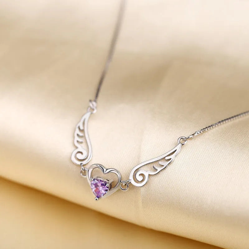 Angel wings necklace in 925 sterling silver with purple crystal heart pendant and 45cm link chain