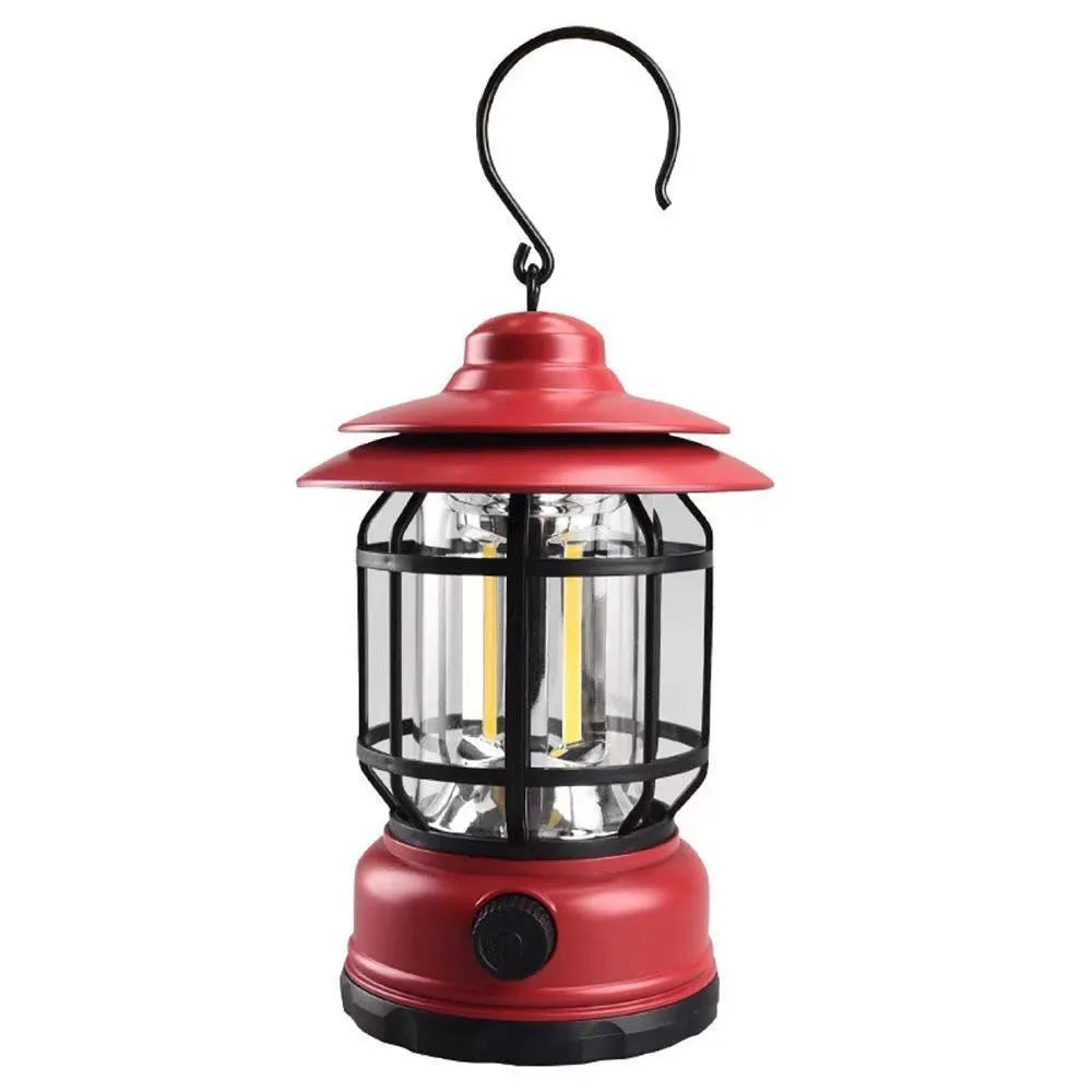 Portable camping lantern in black, red or dark green with dimensions 16.6cm x 6.7cm x 9.6cm